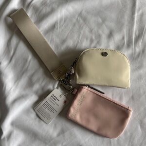 66-69🆕 Lululemon Dual Pouch Wristlet - White Opal/Flush Pink
